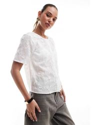 Pieces - Top De Manga Corta Con Botones Delanteros Y Aplicaciones Florales De - Lyst
