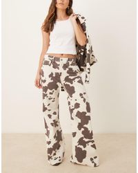 Abercrombie & Fitch - Jeans Bootcut Larghi A Vita Media Con Stampa Pezzata - Lyst
