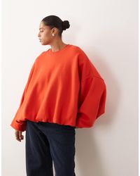 ARRANGE - Curve Bubble Hem Sweatshirt - Lyst