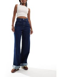 ASOS - – weite jeans mit breitem umschlagsaum und inky-waschung - Lyst