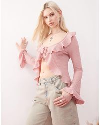 Reclaimed (vintage) - Long Sleeve Ruffle Tie Front Textured Top - Lyst