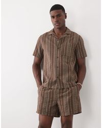 ASOS - Short d'ensemble large et élastique mi-long à rayures - marron - Lyst
