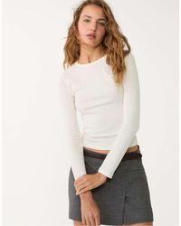 Stradivarius - Geribbeld T-Shirt Met Lange Mouwen - Lyst