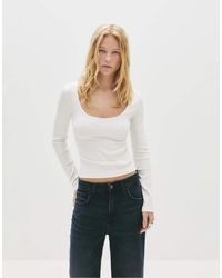 Pull&Bear - Maglietta Maniche Lunghe Bianca A Coste - Lyst