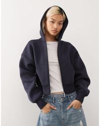 Weekday - – kastige oversize-kapuzenjacke aus neoprenähnlichem material - Lyst