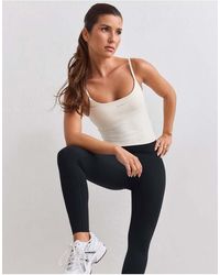 Aim'n - Sculpting Scrunch Tights - Lyst
