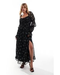 ASOS - Robe mi-longue à taille froncée et manches longues tendance folk - imprimé fleurs - Lyst