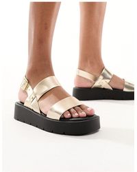 Schuh - Tayla - sandali color con doppie fascette e cinturino posteriore - Lyst
