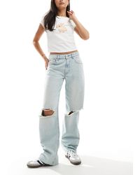 ASOS - Jean baggy à déchirures - délavage clair - Lyst