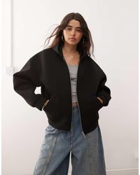 Weekday - Sudadera Negra Extragrande Con Capucha Y Cremallera De Tejido Efecto Neopreno Scarlet De - Lyst