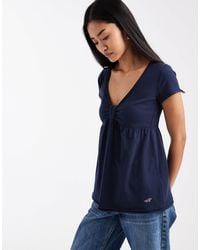 Hollister - Kurzärmliges Babydoll-Oberteil in Easy Fit - Lyst