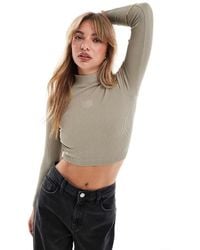 HERA - Ribbed Base Long Sleeve Crop - Lyst