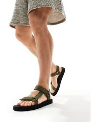 Truffle Collection - – sandalen mit breiten riemchen aus webstoff - Lyst