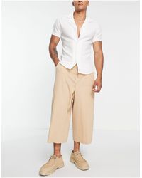 ASOS - Pantaloni culotte eleganti con fondo molto ampio color pietra stropicciato - Lyst