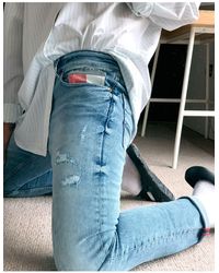 Tommy Hilfiger Scanton - Smalle Distressed Jeans Met Zak Met Vlag - Blauw