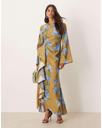 ASOS - Robe longue à manches longues avec jupe volantée - vert à imprimé fleurs oversize - Lyst