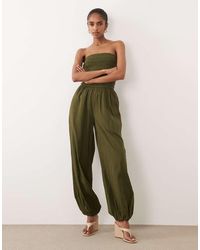 Nobody's Child - Carly Cotton Bandeau Shirred Bodice Balloon Leg Jumpsuit - Lyst