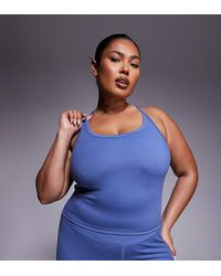 4505 - Curve Icon Yoga Cami With Inner Bra And Adjustable Straps - Lyst
