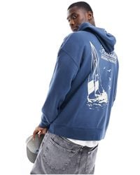 Hollister - Oversized Hoodie With Back Print - Lyst