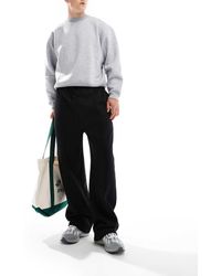 ASOS - Joggingbroek Met Wijde Pijpen En Platgestikte Plooitjes - Lyst