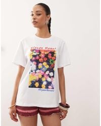 Reclaimed (vintage) - Oversized T-shirt With Licensed Monet Flower Print - Lyst