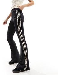 adidas Originals - Leopard Luxe Flared leggings - Lyst