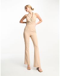 In The Style - Tailored Halterneck Sleeveless Flared Jumpsuit - Lyst