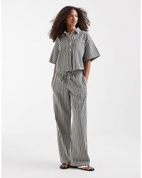 River Island - Tie Waist Wide Leg Striped Jeans - Lyst