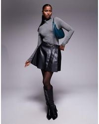 River Island - Faux Leather Snaffle Metal Detail Pleated Mini Skirt - Lyst