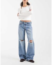 Levi's - Losse Jeans Met Lage Taille En Scheuren - Lyst