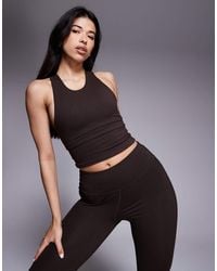 4505 - Icon Racer Back Vest With Inner Bra And Removable Padding - Lyst