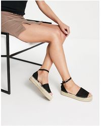 Alpargatas negras efecto cocodrilo con diseño en dos partes South Beach de  color Negro | Lyst
