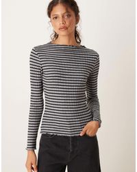 Vila - – hochgeschlossenes, geripptes oberteil mit streifen - Lyst