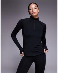 4505 - Icon Thermal 1/Zip Long Sleeve Running Top - Lyst