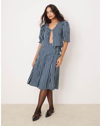 Glamorous - Jupe d'ensemble longueur mollet style kilt avec rayures et liens noués sur les côtés - vert - Lyst