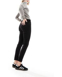 Lee Jeans - Lee - scarlett - jeans skinny a vita alta neri - Lyst