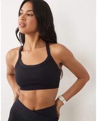 4505 - Seamless Baby Rib Racer Back Sports Bra With Adjustable Strap - Lyst