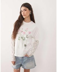 Miss Selfridge - Oversized T-shirt With Lace Sleeve And Flower Print - Lyst