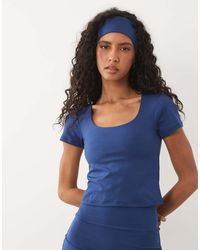 4505 - Active Scoop Neck Baby Tee With Inner Bra And Removable Padding - Lyst