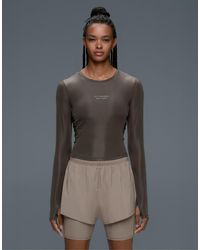 Oysho - Long-sleeved Technical T-shirt With Text - Lyst