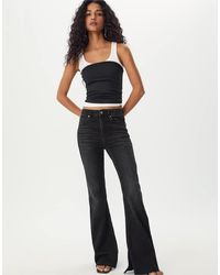 Stradivarius - Flared Jeans Met Split - Lyst