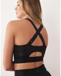4505 - Active High Support Sports Bra With Removable Padding And Adjustable Straps - Lyst