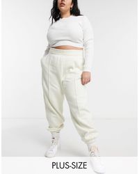 nike mini swoosh oversized sweatpants