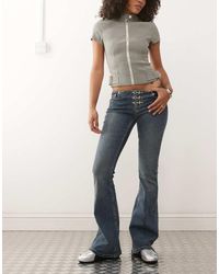 The Ragged Priest - Low Rise Buckle Detail Flare Jean - Lyst