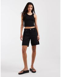 ONLY - Mid Rise Longline Denim Shorts - Lyst