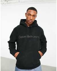Calvin Klein - Sweat à capuche en polaire épaisse double face avec logo devant - Lyst