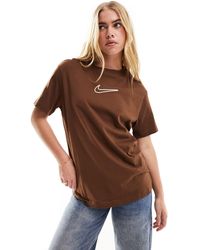 Nike - Camiseta marrón unisex extragrande con logo mediano - Lyst