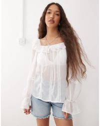 Reclaimed (vintage) - Top transparent à encolure carrée avec volants et bordures en dentelle - Lyst