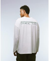 ASOS - Super Heavyweight Premium Oversized Long Sleeve T-Shirt With Dropped Shoulder And Text Graphic - Lyst