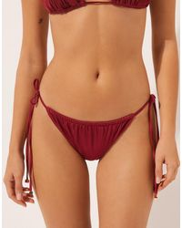 Calzedonia - Shiny Satin Thong Bikini Bottom - Lyst